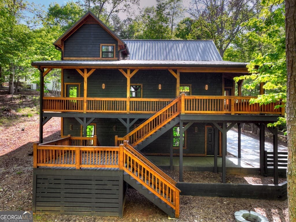 4 bedroom, 3.5 bathroom, 2,831 sq ft cabin,single family residence for sale at 40 Cadet Court, Ellijay, GA 30540 — photo 3