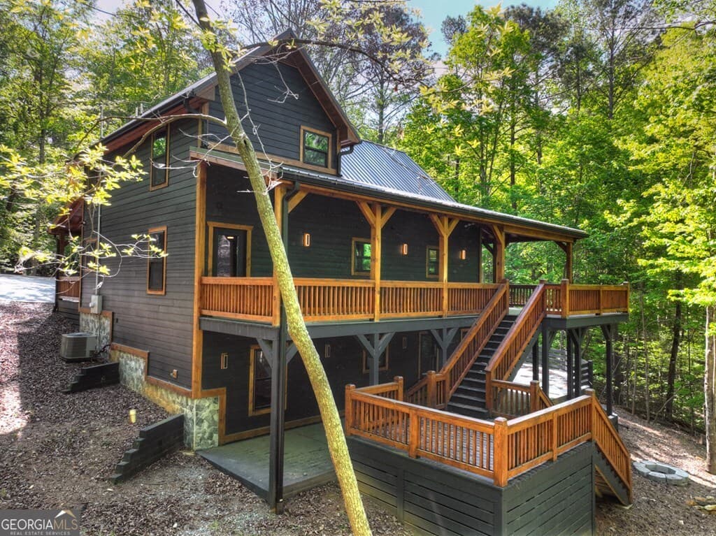 4 bedroom, 3.5 bathroom, 2,831 sq ft cabin,single family residence for sale at 40 Cadet Court, Ellijay, GA 30540 — photo 9