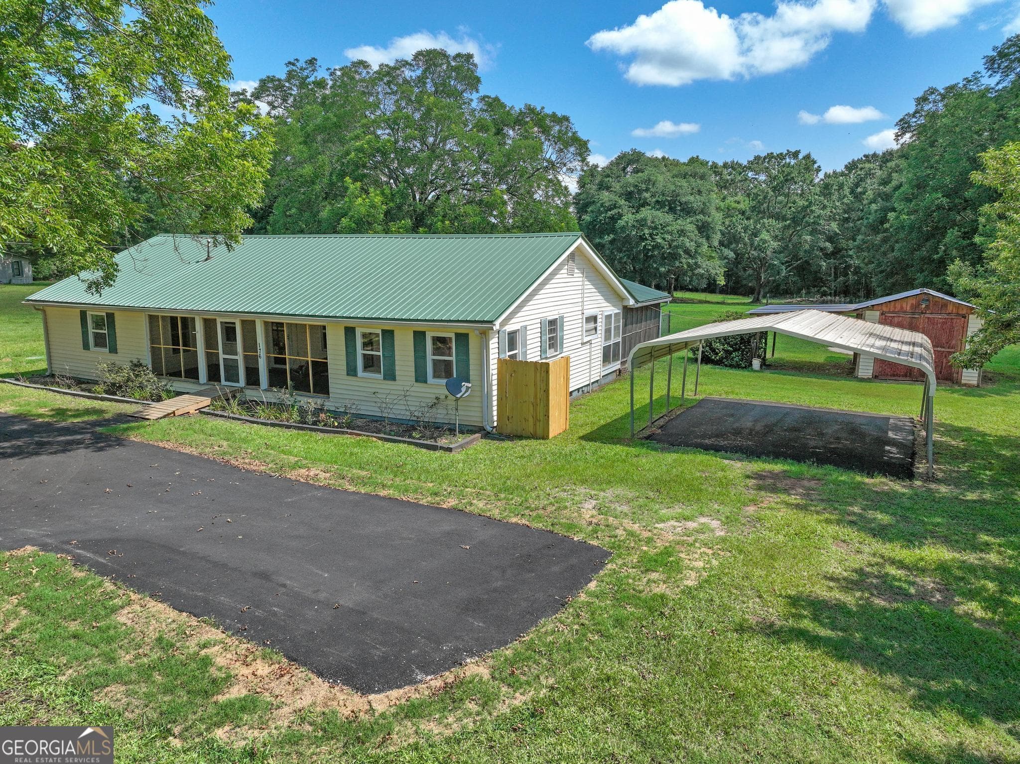 3 bedroom, 2 bathroom, 1,580 sq ft manufactured home,single family residence for sale at 176 Midland Street, Williamson, GA 30292 — photo 5