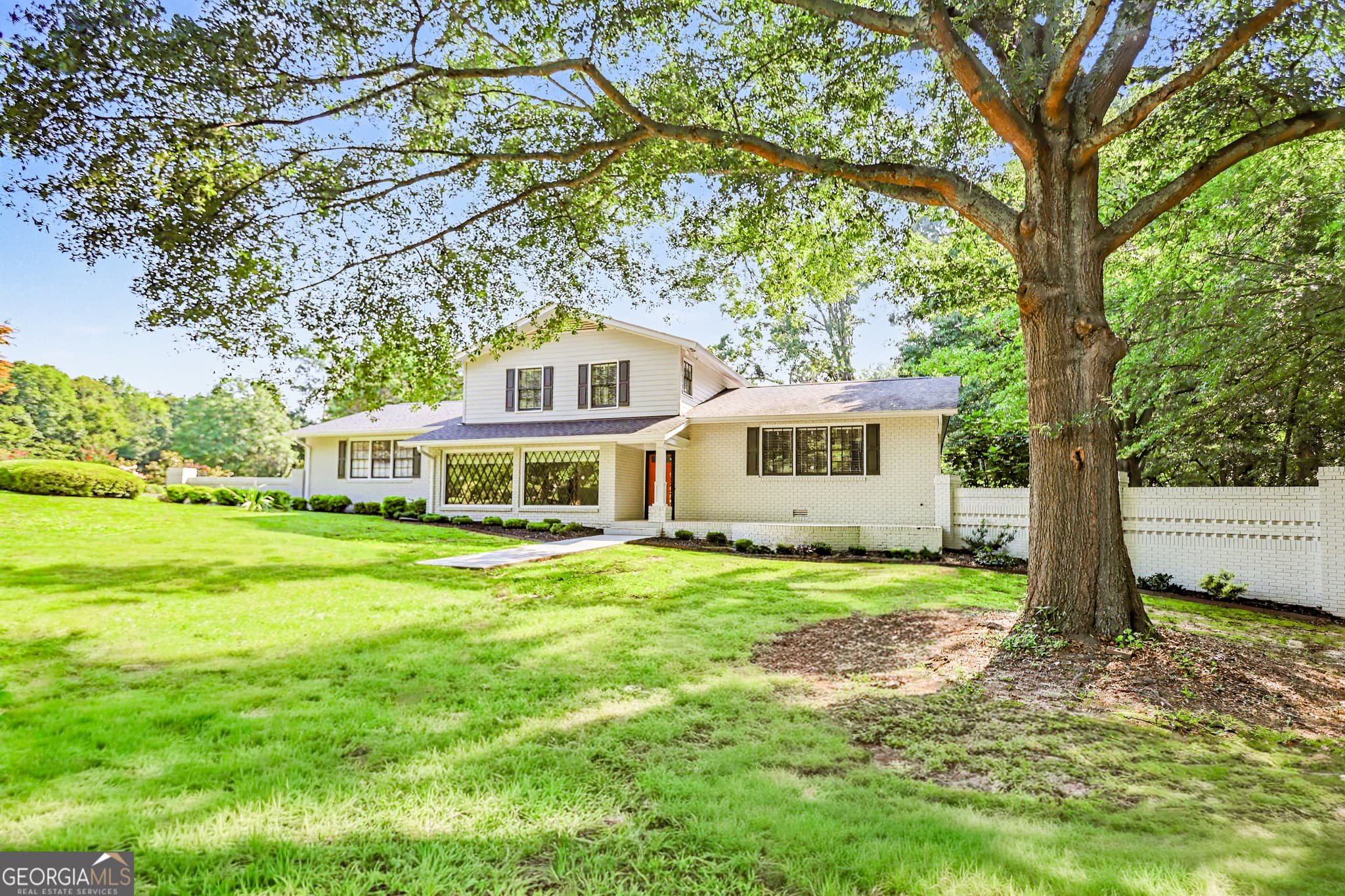 4 bedroom, 3.5 bathroom, 3,200 sq ft single family residence for sale at 235 Minish Lake Road, Commerce, GA 30530 — photo 2