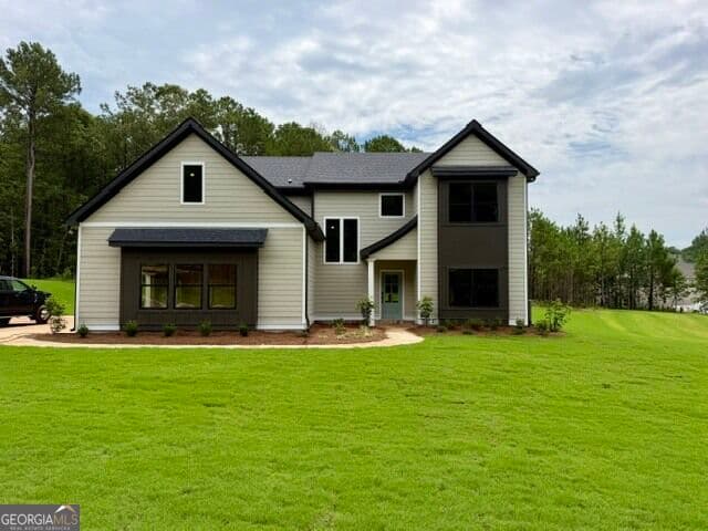 5 bedroom, 4 bathroom, 3,406 sq ft single family residence for sale at 27 Turra Cove LOT 5, Palmetto, GA 30268 — photo 1 of 20