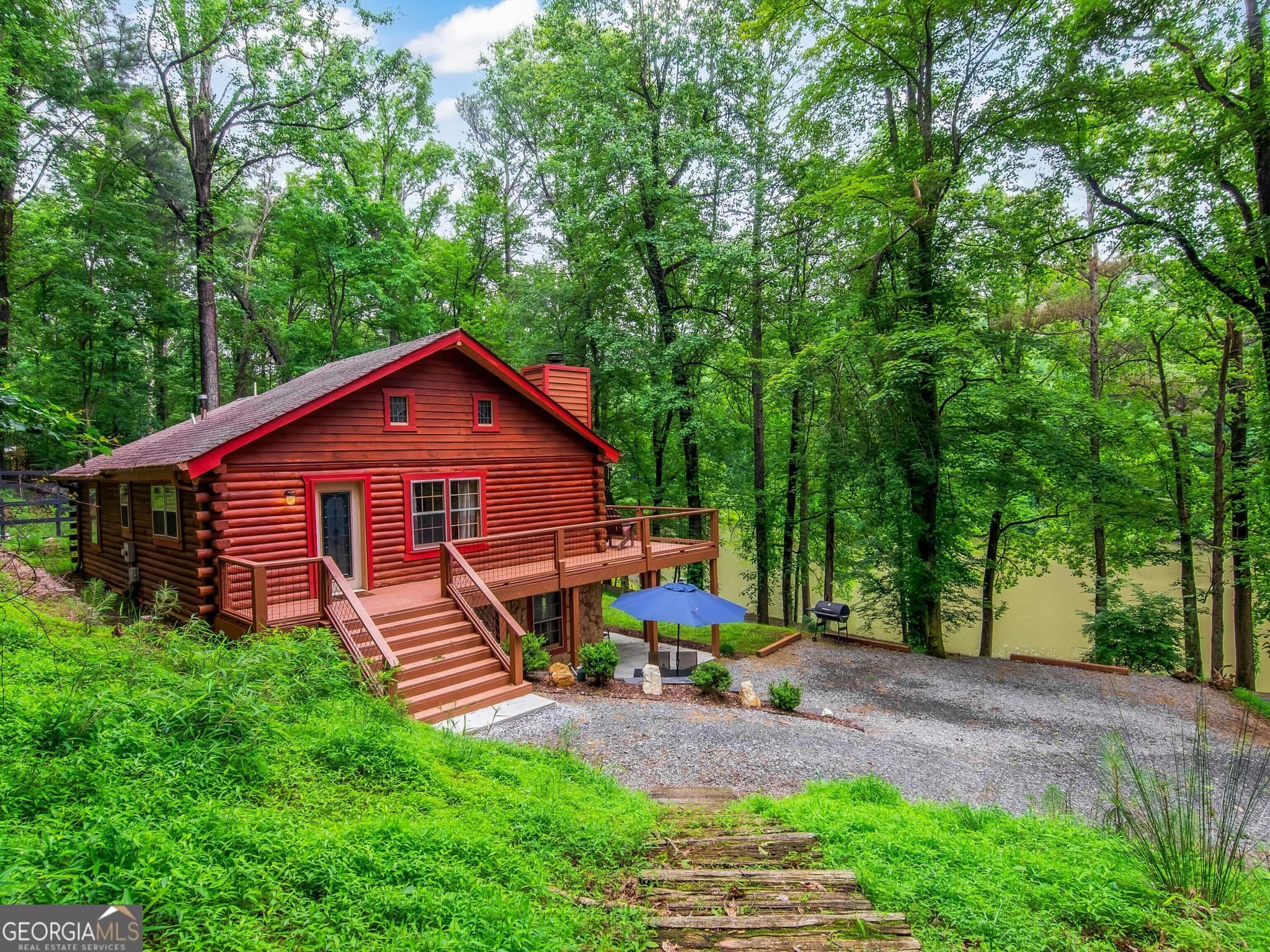 3 bedroom, 2 bathroom, 2,016 sq ft cabin,single family residence for sale at 165 Timberwalk Drive, Ellijay, GA 30540 — photo 1 of 47