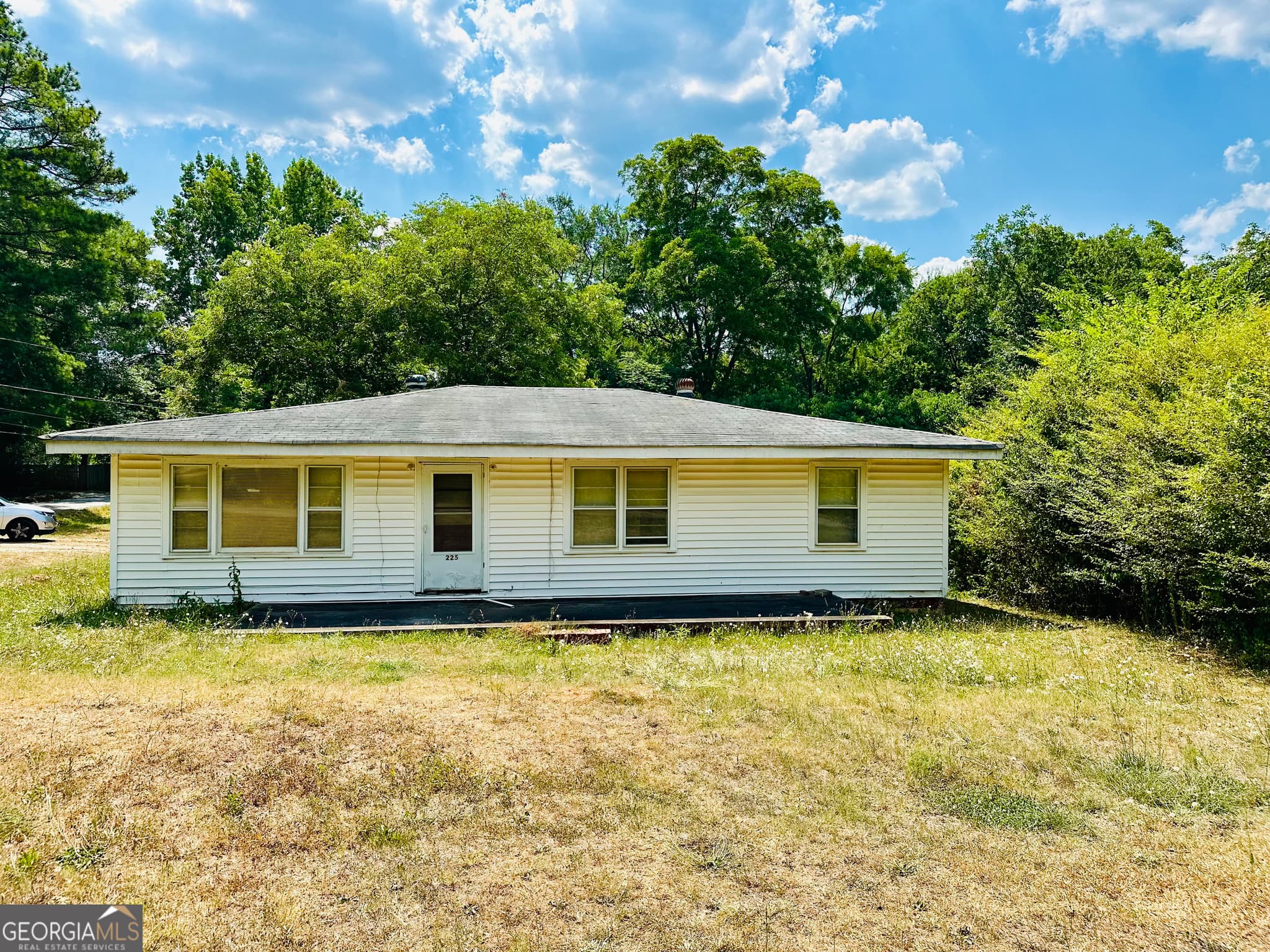 3 bedroom, 1 bathroom, 1,460 sq ft single family residence for sale at 225 Bell Street, Covington, GA 30016 — photo 1 of 2