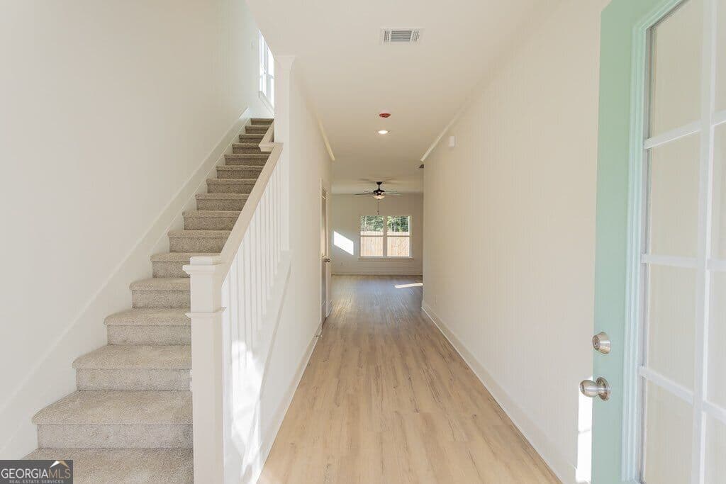 4 bedroom, 2.5 bathroom, 2,295 sq ft single family residence for sale at 3041 Sea Aster Way, Buford, GA 30519 — photo 3