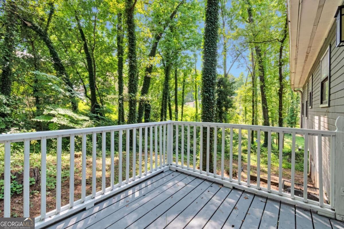 6 bedroom, 3 bathroom, 2,734 sq ft single family residence for sale at 5322 Scarbrough Round, Stone Mountain, GA 30088 — photo 2
