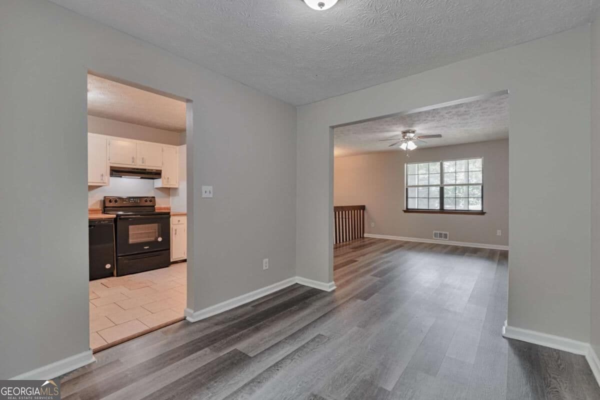 6 bedroom, 3 bathroom, 2,734 sq ft single family residence for sale at 5322 Scarbrough Round, Stone Mountain, GA 30088 — photo 7