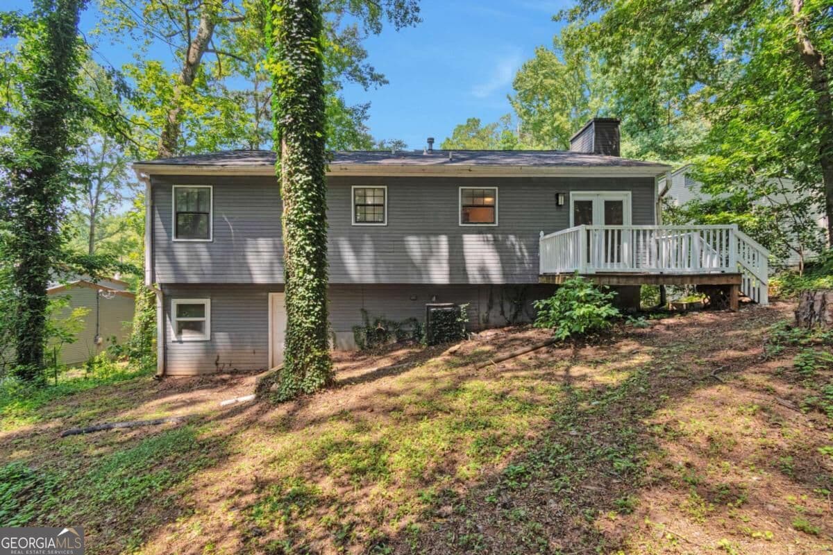 6 bedroom, 3 bathroom, 2,734 sq ft single family residence for sale at 5322 Scarbrough Round, Stone Mountain, GA 30088 — photo 3