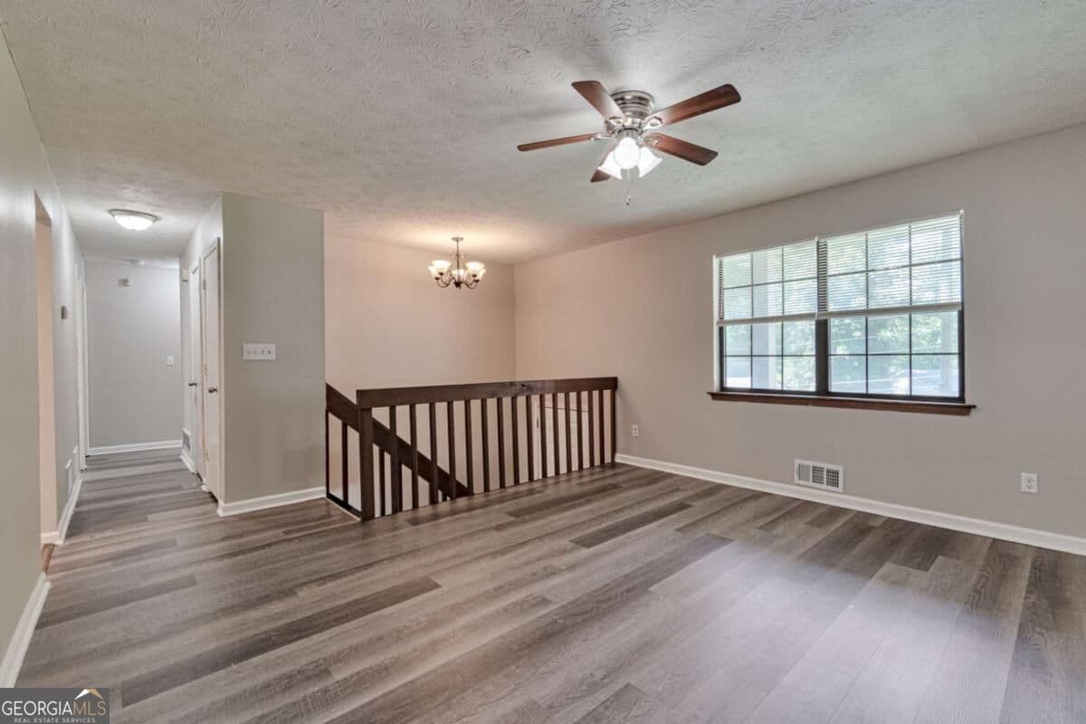 6 bedroom, 3 bathroom, 2,734 sq ft single family residence for sale at 5322 Scarbrough Round, Stone Mountain, GA 30088 — photo 10