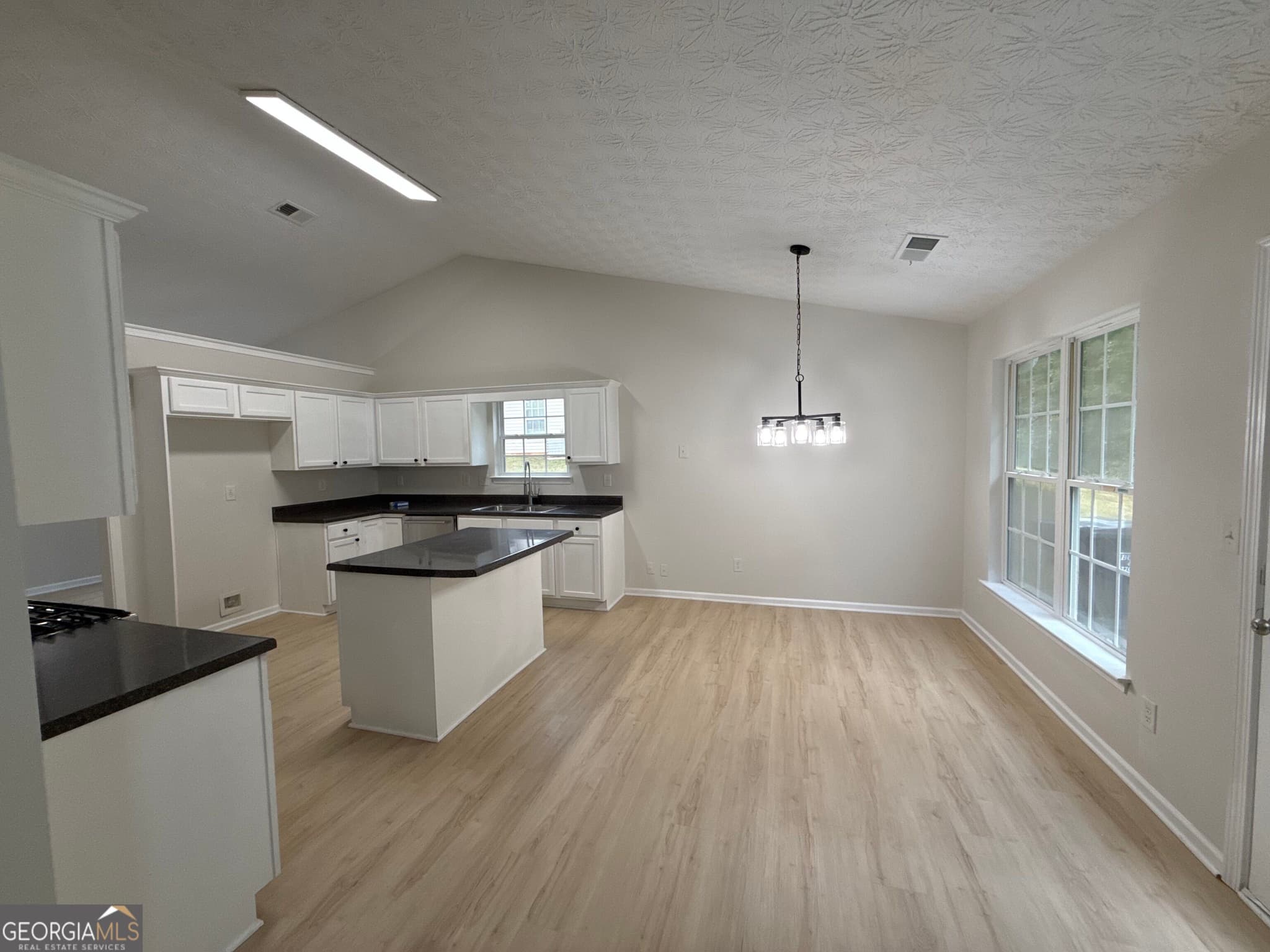 4 bedroom, 2 bathroom, 2,390 sq ft single family residence for sale at 180 Meadowbrook Court, Covington, GA 30016 — photo 5