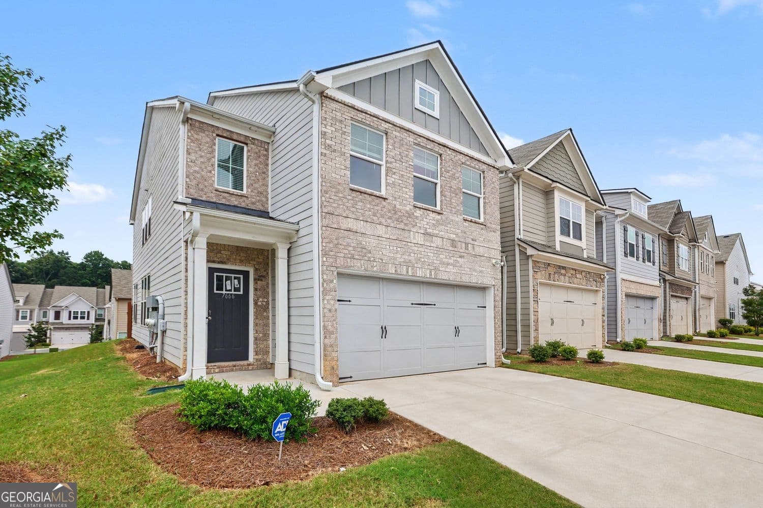 3 bedroom, 2.5 bathroom, 2,024 sq ft townhouse for sale at 7666 Squire Court, Fairburn, GA 30213 — photo 1 of 35