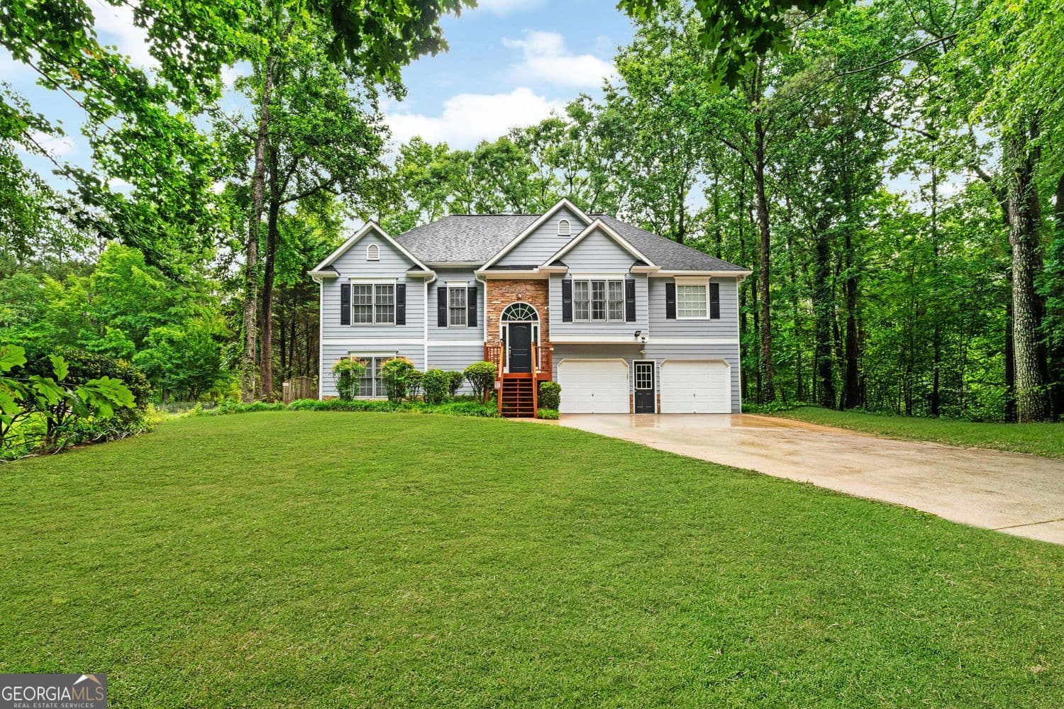 5 bedroom, 3 bathroom, 2,462 sq ft single family residence sold at 205 Brookhaven Place, Canton, GA 30114