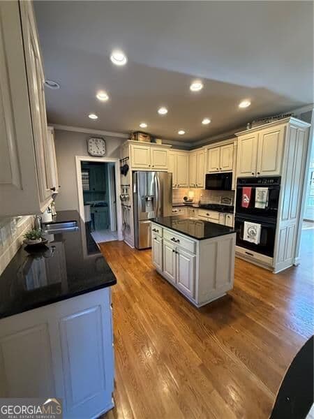 4 bedroom, 4.5 bathroom, 3,564 sq ft single family residence for sale at 5812 Ripplestone Court, Acworth, GA 30101 — photo 7