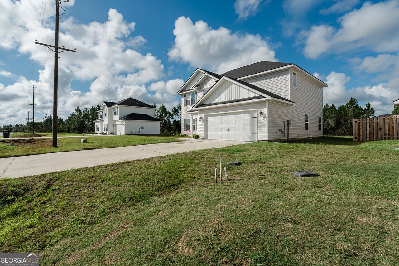 4 bedroom, 2.5 bathroom, 2,264 sq ft single family residence for sale at 446 McClelland Road, Ludowici, GA 31316 — photo 2