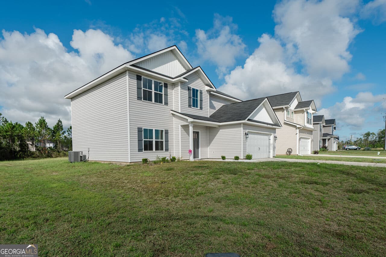 4 bedroom, 2.5 bathroom, 2,264 sq ft single family residence for sale at 446 McClelland Road, Ludowici, GA 31316 — photo 3