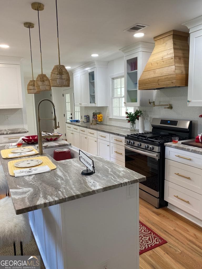 5 bedroom, 3.5 bathroom, 2,489 sq ft single family residence for sale at 1611 Carlton Avenue, Stone Mountain, GA 30087 — photo 6