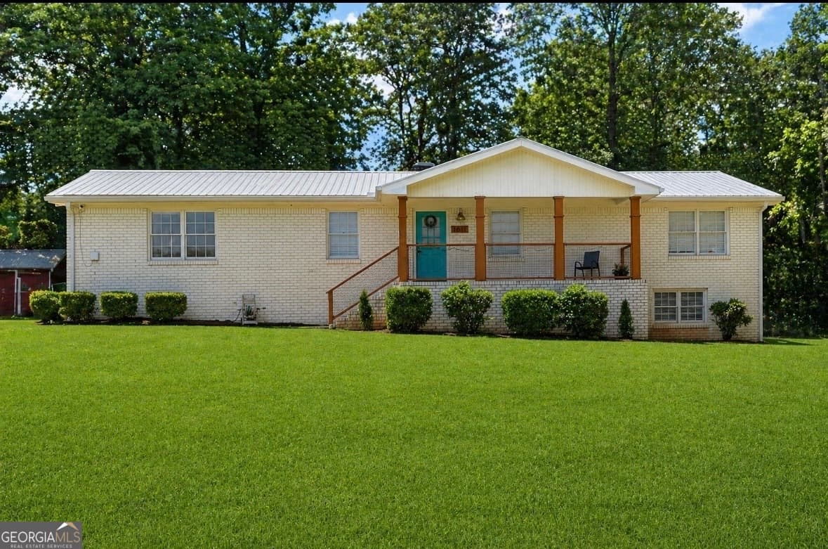 5 bedroom, 3.5 bathroom, 2,489 sq ft single family residence for sale at 1611 Carlton Avenue, Stone Mountain, GA 30087