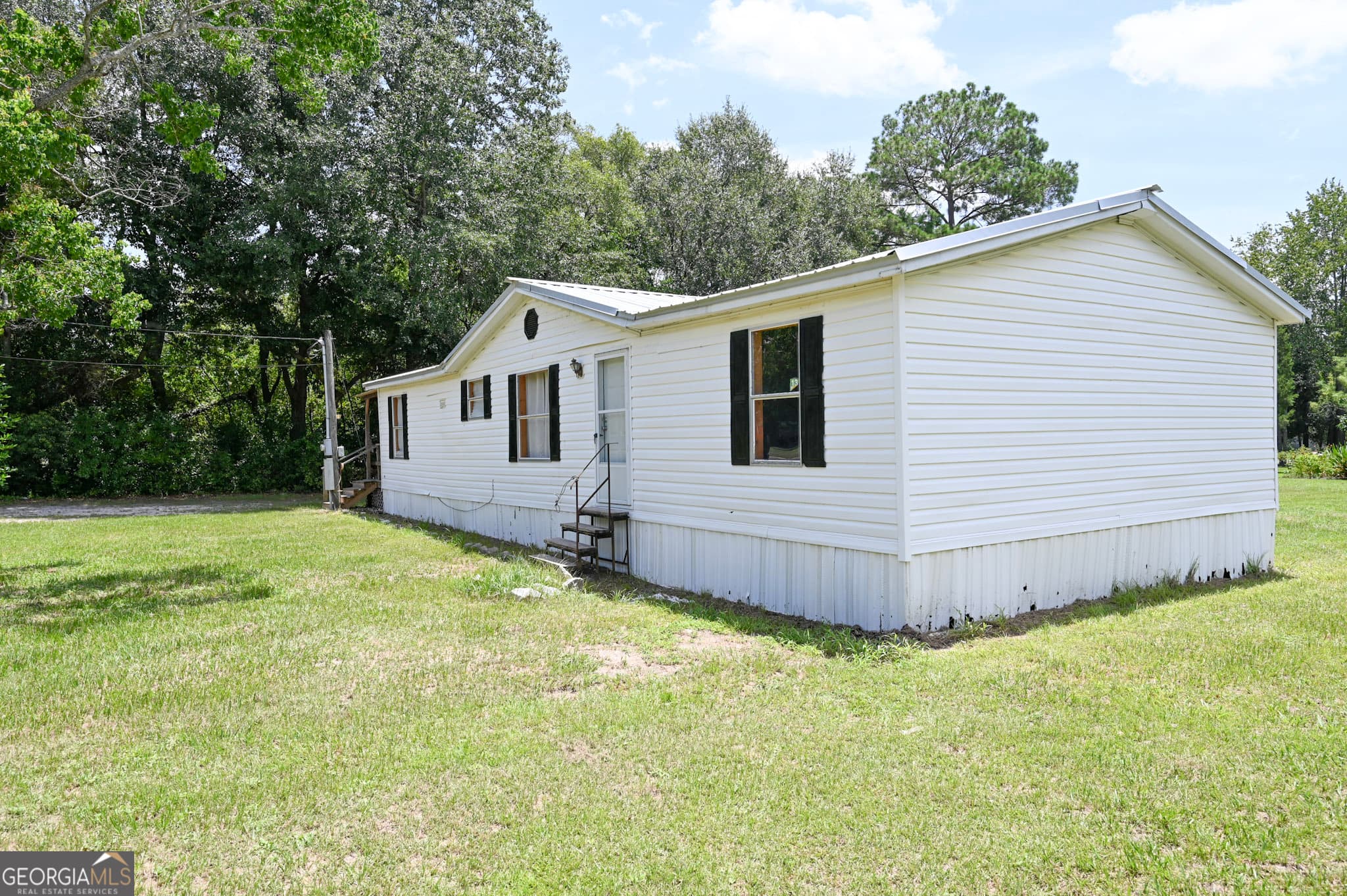 3 bedroom, 2 bathroom, 1,272 sq ft manufactured home,single family residence for sale at 1957 Brogdon Road, Waycross, GA 31503 — photo 2