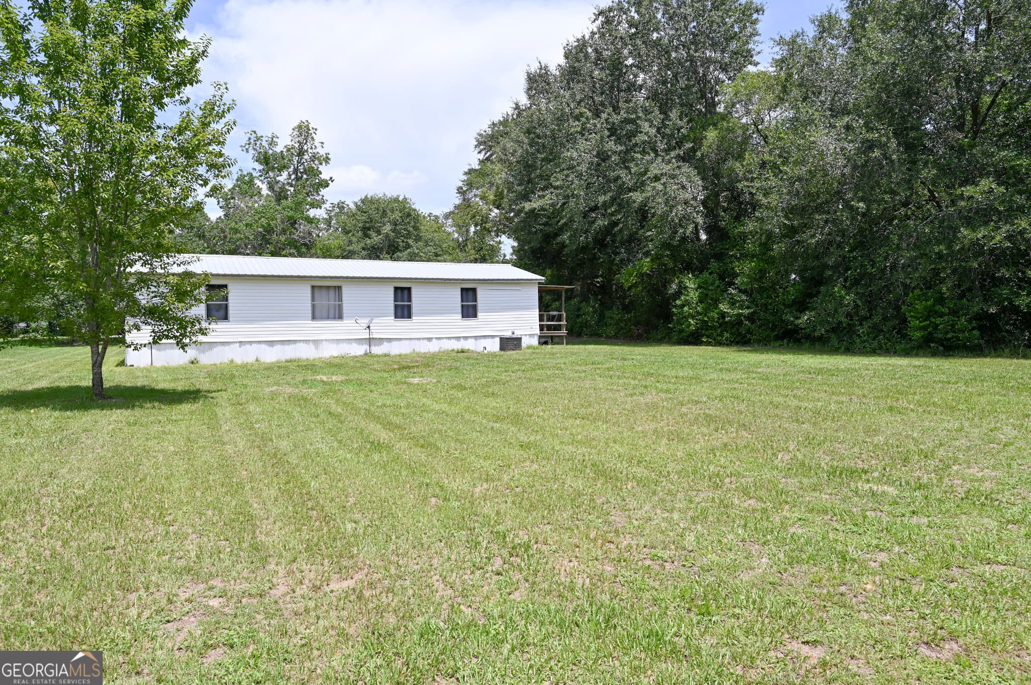 3 bedroom, 2 bathroom, 1,272 sq ft manufactured home,single family residence for sale at 1957 Brogdon Road, Waycross, GA 31503 — photo 6