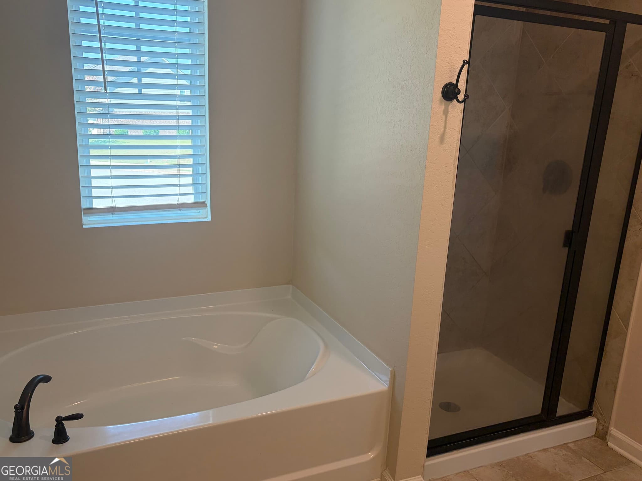 4 bedroom, 2.5 bathroom, 2,157 sq ft single family residence for sale at 136 Al Jennah Boulevard, Locust Grove, GA 30248 — photo 9