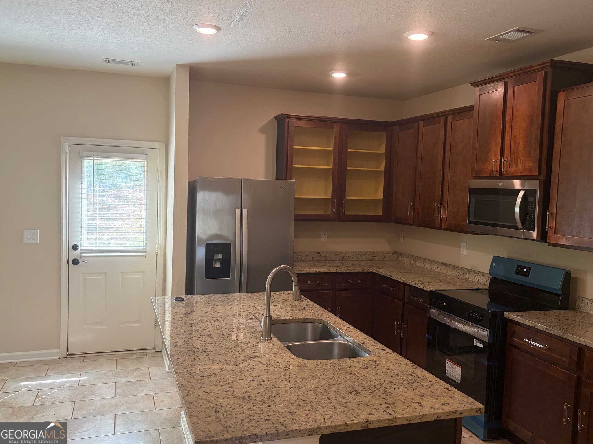 4 bedroom, 2.5 bathroom, 2,157 sq ft single family residence for sale at 136 Al Jennah Boulevard, Locust Grove, GA 30248 — photo 4