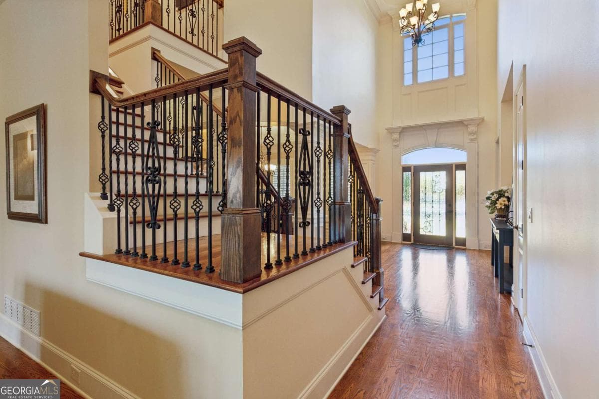 4 bedroom, 4.5 bathroom, 3,958 sq ft single family residence for sale at 5640 Copper Creek Pass, Cumming, GA 30040 — photo 5