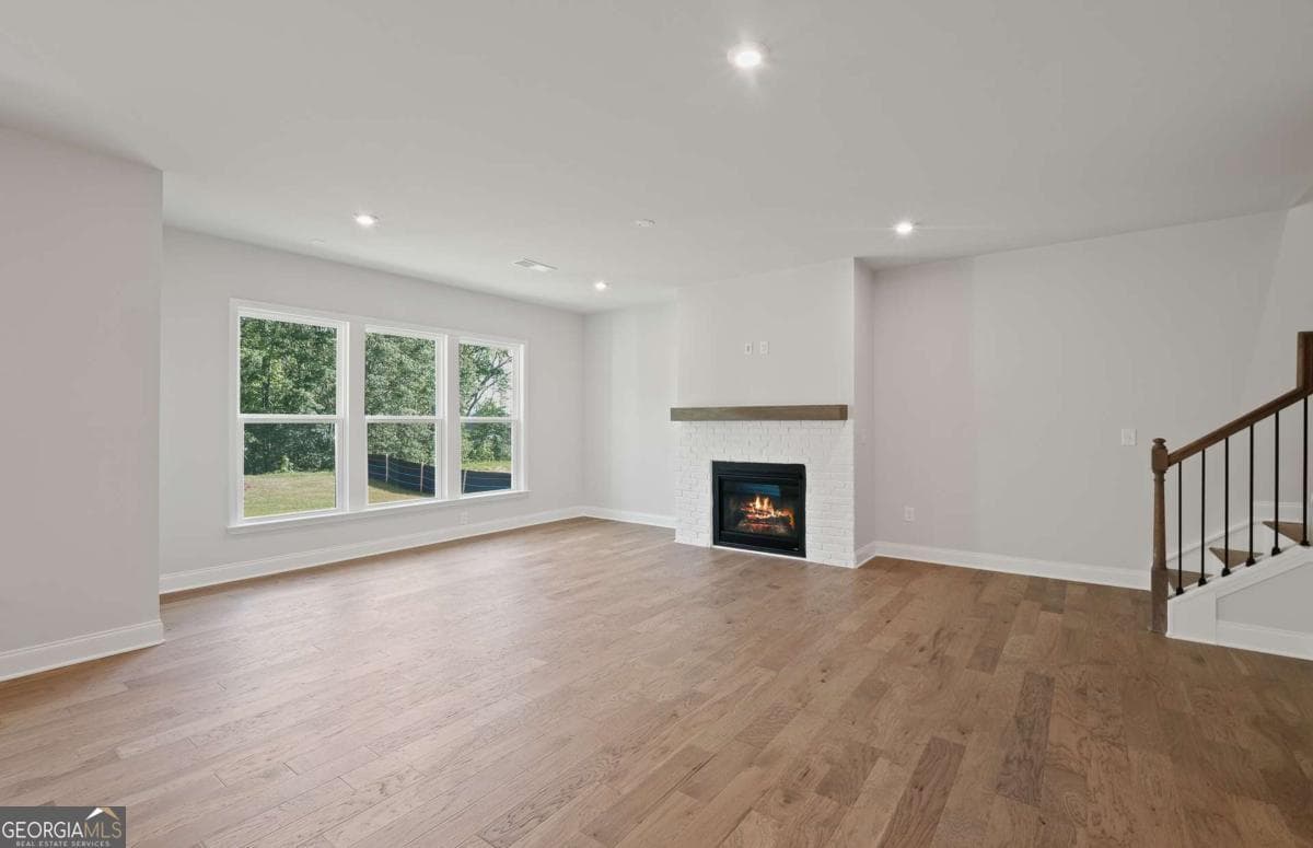 5 bedroom, 4 bathroom, 3,083 sq ft single family residence for sale at 121 Lucas Court, Hoschton, GA 30548 — photo 7