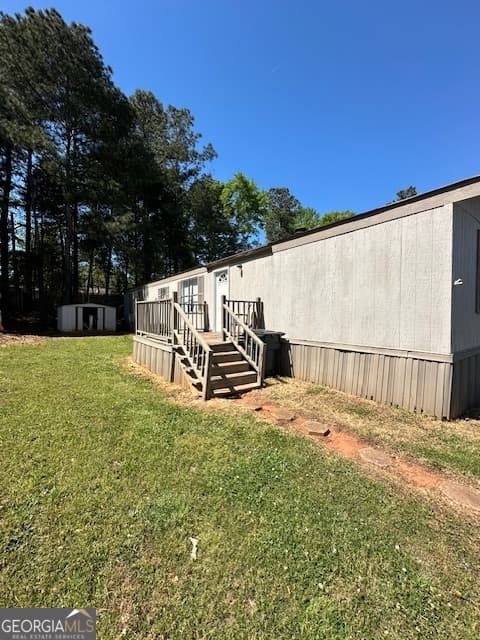 2 bedroom, 2 bathroom, 924 sq ft manufactured home,single family residence for sale at 334 Robin Lane # 334R, Mcdonough, GA 30253 — photo 2
