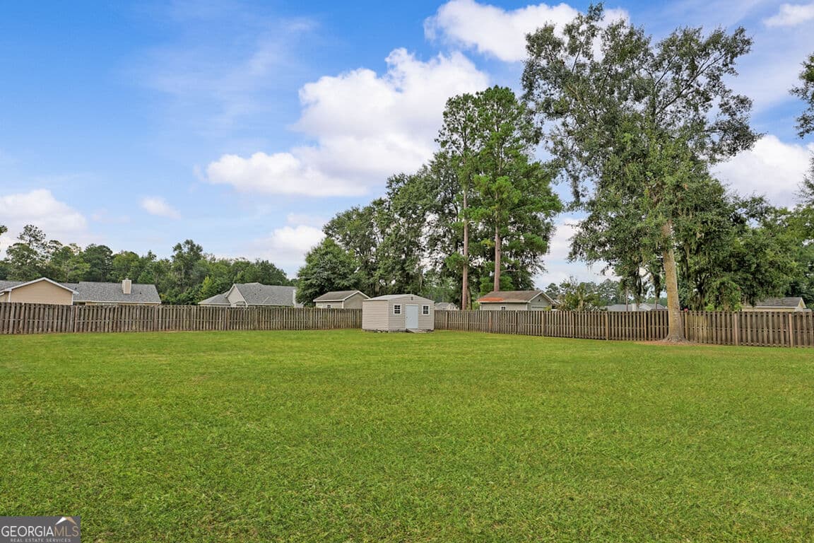 5 bedroom, 2 bathroom, 2,260 sq ft single family residence for sale at 211 Cyane Lane, Guyton, GA 31312 — photo 6