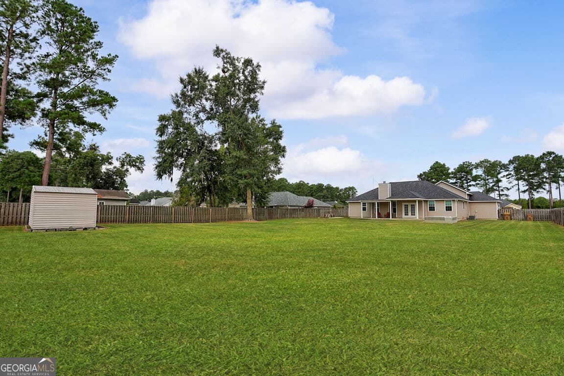 5 bedroom, 2 bathroom, 2,260 sq ft single family residence for sale at 211 Cyane Lane, Guyton, GA 31312 — photo 5