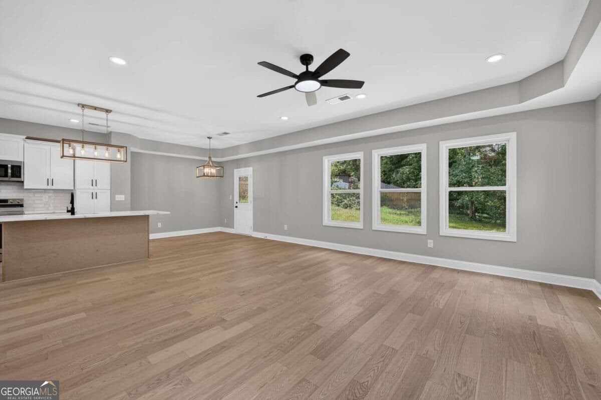 4 bedroom, 3.5 bathroom single family residence for sale at 1717 Hilton Ridge Court, Lithonia, GA 30058 — photo 7