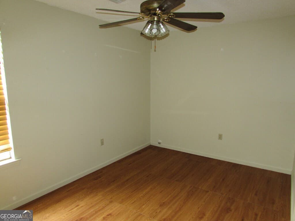4 bedroom, 2 bathroom, 1,565 sq ft single family residence for sale at 1827 Tarver Drive, Blakely, GA 39823 — photo 6