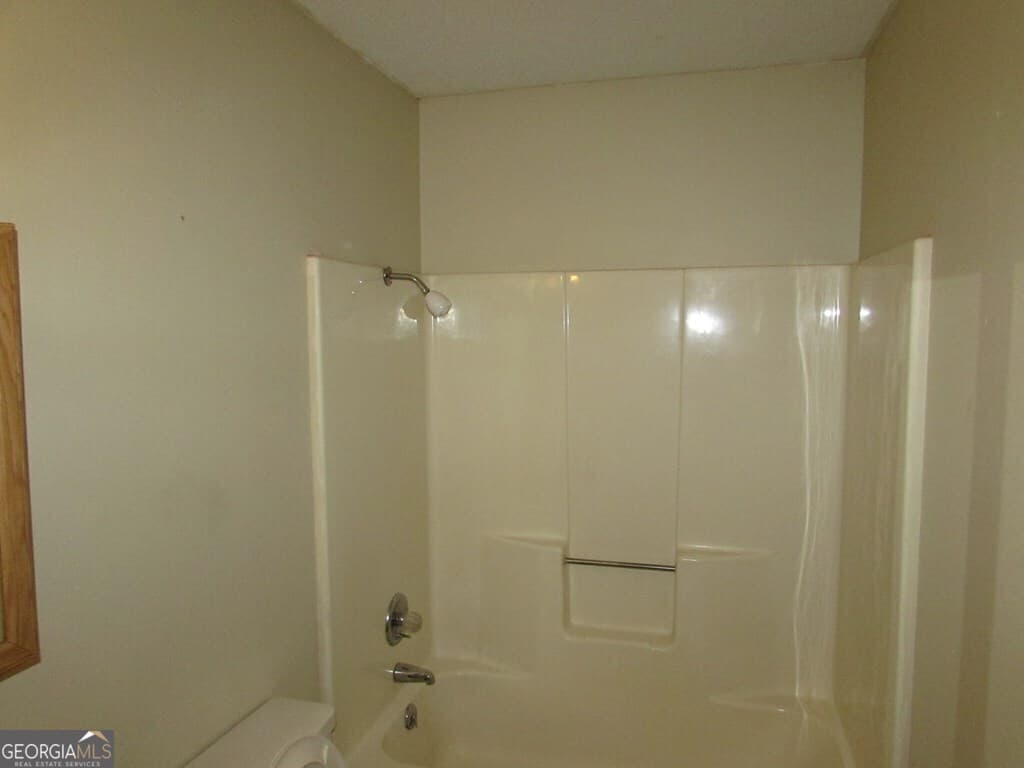 4 bedroom, 2 bathroom, 1,565 sq ft single family residence for sale at 1827 Tarver Drive, Blakely, GA 39823 — photo 4
