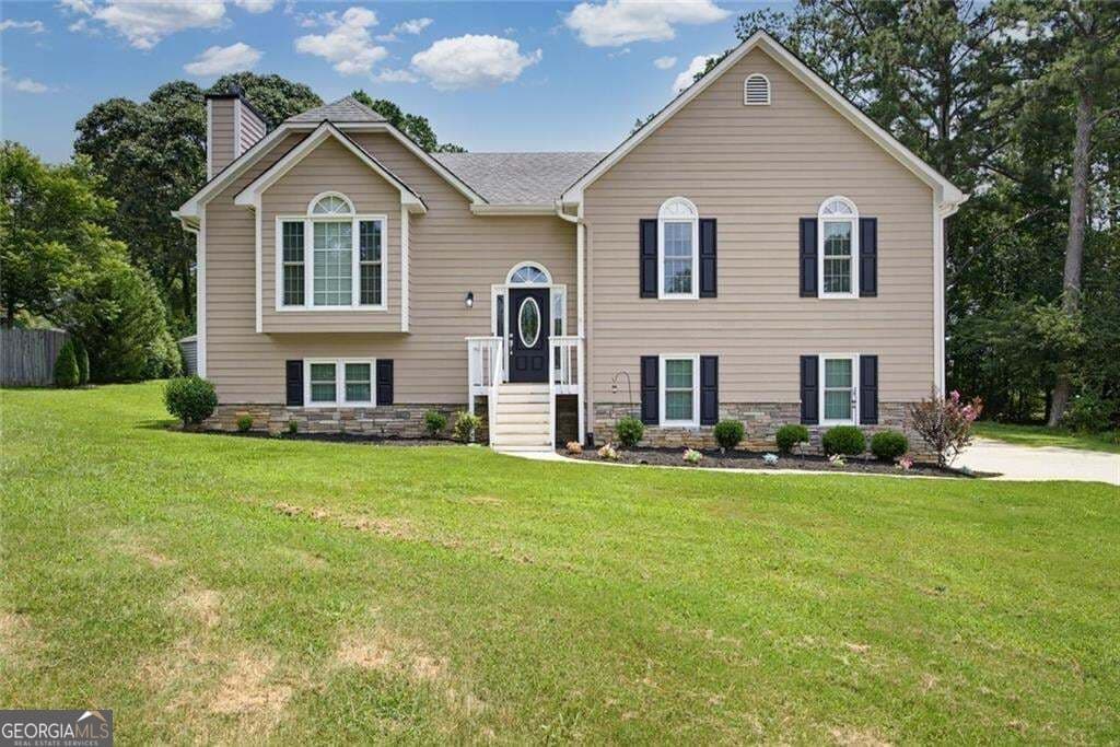 4 bedroom, 3 bathroom, 2,137 sq ft single family residence for sale at 1822 Penrose Court, Powder Springs, GA 30127 — photo 2