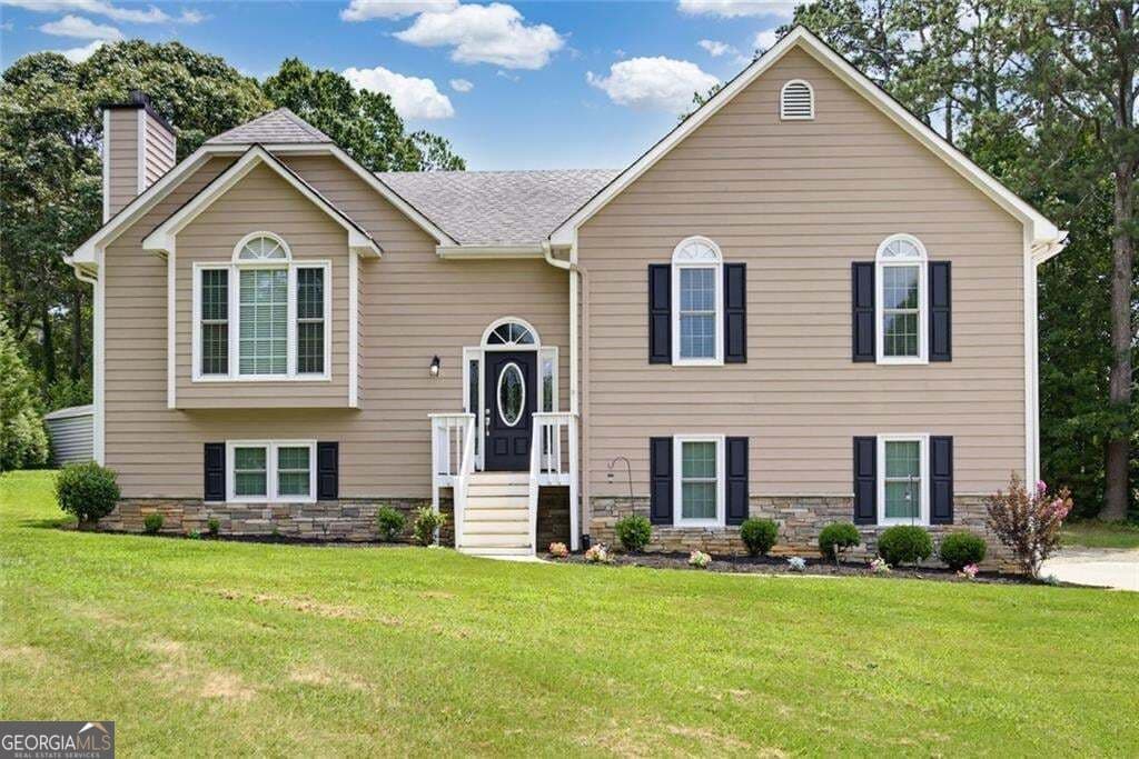 4 bedroom, 3 bathroom, 2,137 sq ft single family residence for sale at 1822 Penrose Court, Powder Springs, GA 30127