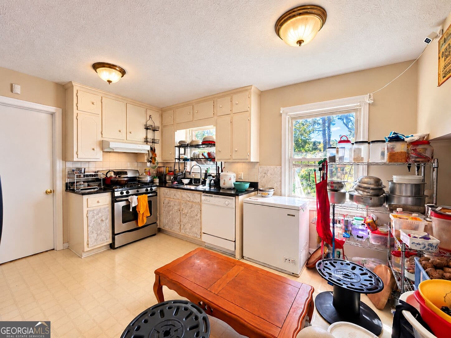 4 bedroom, 2 bathroom, 1,953 sq ft single family residence for sale at 4025 Seven Hills Trail, Stone Mountain, GA 30083 — photo 3