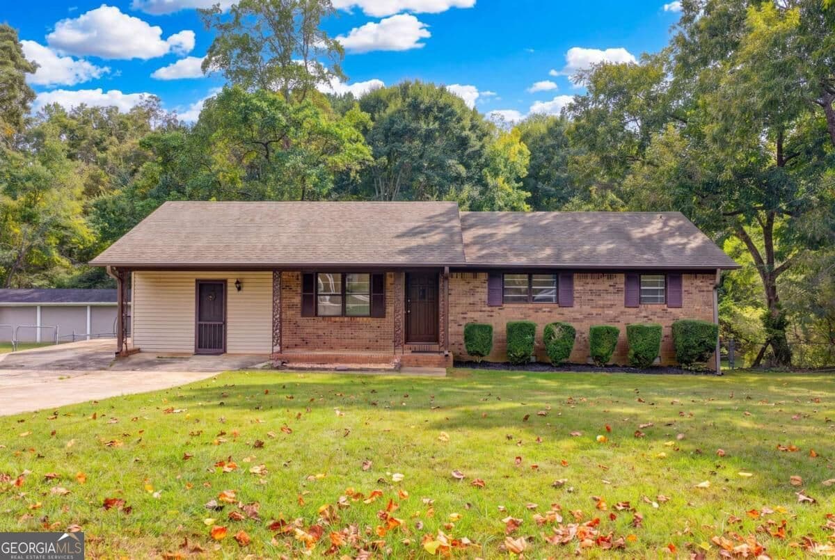 4 bedroom, 2 bathroom, 1,512 sq ft single family residence for sale at 4921 Merlin Drive, Oakwood, GA 30566 — photo 2