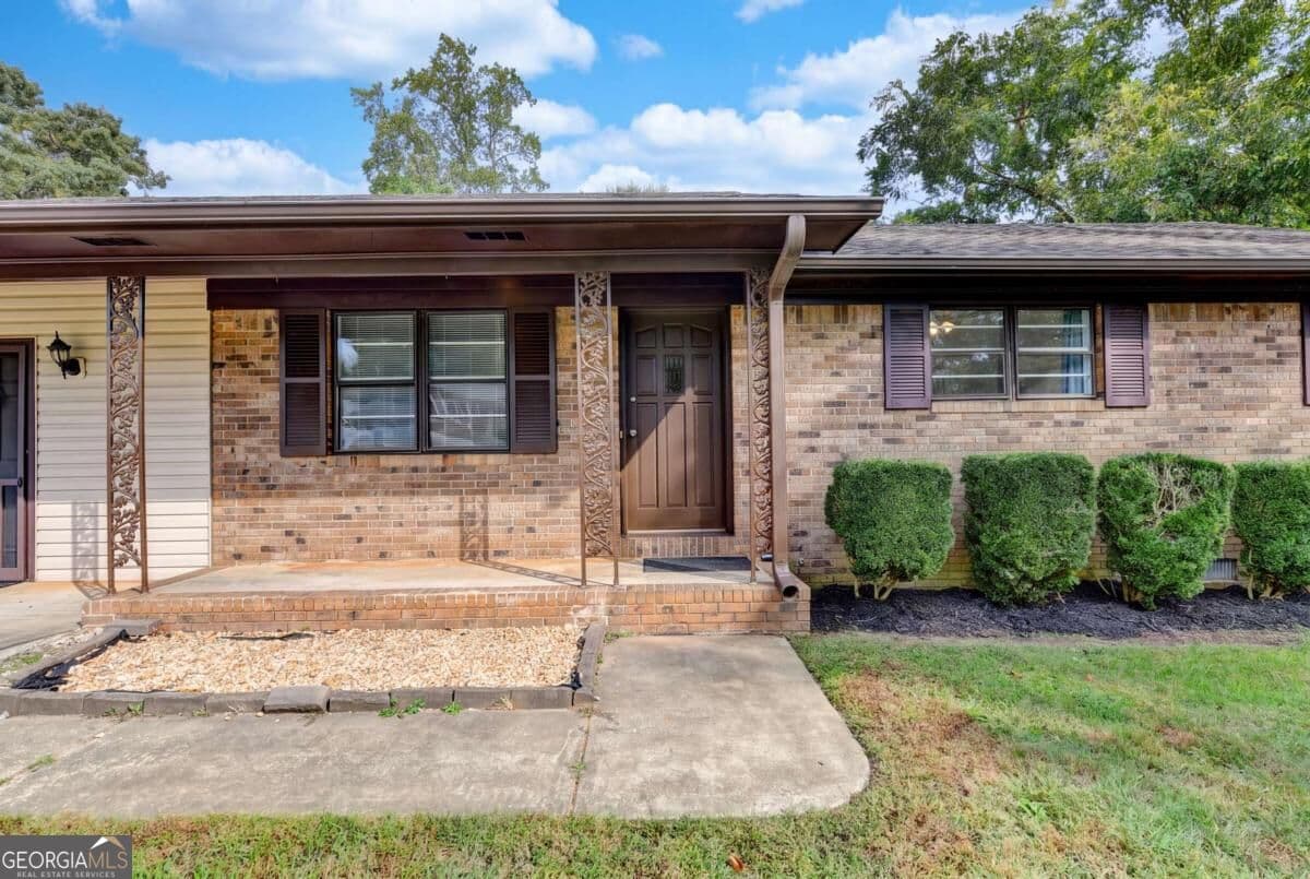 4 bedroom, 2 bathroom, 1,512 sq ft single family residence for sale at 4921 Merlin Drive, Oakwood, GA 30566 — photo 3