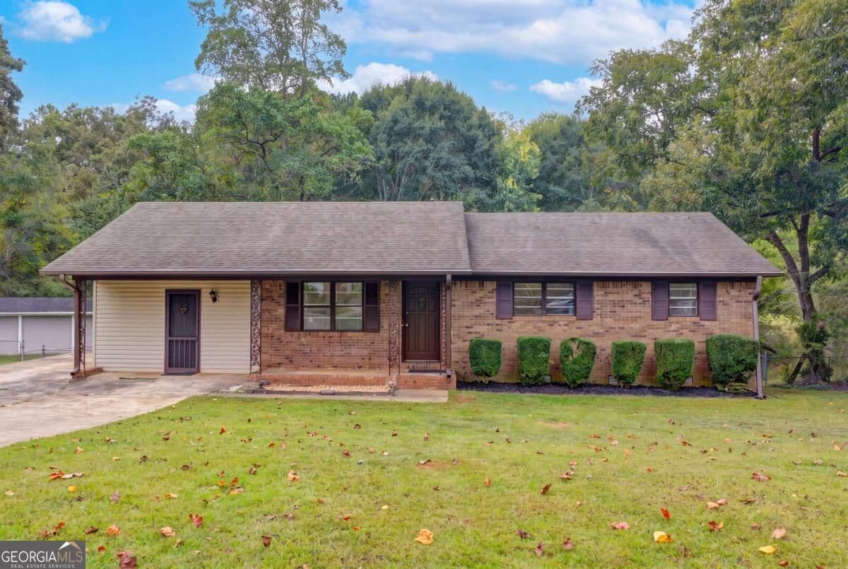 4 bedroom, 2 bathroom, 1,512 sq ft single family residence for sale at 4921 Merlin Drive, Oakwood, GA 30566 — photo 1 of 48