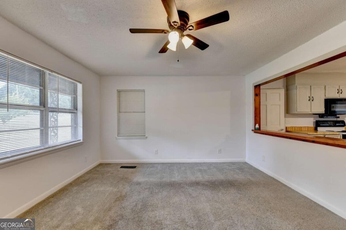 4 bedroom, 2 bathroom, 1,512 sq ft single family residence for sale at 4921 Merlin Drive, Oakwood, GA 30566 — photo 9
