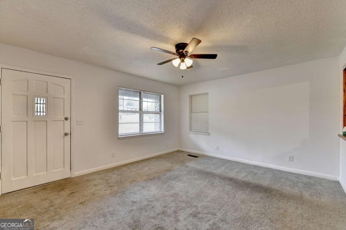 4 bedroom, 2 bathroom, 1,512 sq ft single family residence for sale at 4921 Merlin Drive, Oakwood, GA 30566 — photo 10