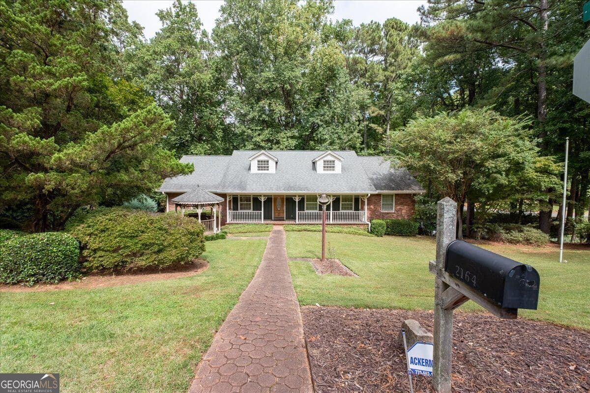 4 bedroom, 3 bathroom, 3,929 sq ft single family residence for sale at 2164 Carson Valley Drive, Tucker, GA 30084 — photo 2