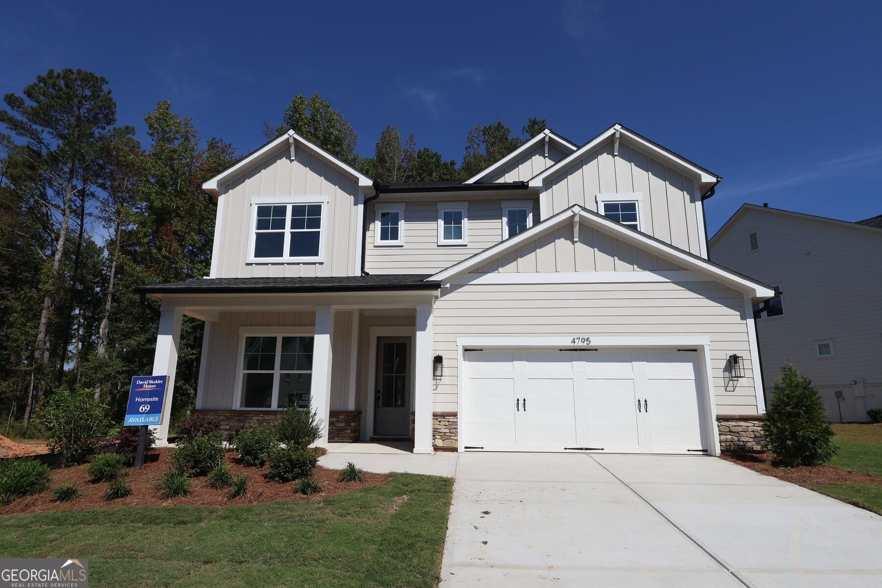 4 bedroom, 4.5 bathroom, 3,012 sq ft single family residence for sale at 4795 Briscoe Drive, Cumming, GA 30028 — photo 1 of 13
