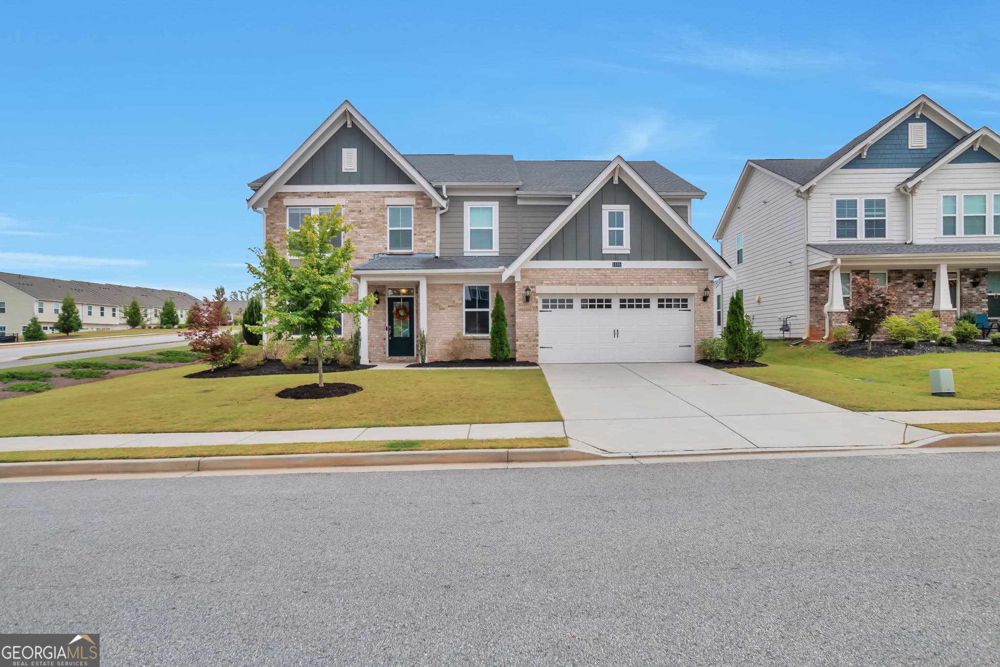 5 bedroom, 3 bathroom, 2,915 sq ft single family residence for sale at 1106 Michigan Circle, Hoschton, GA 30548 — photo 2