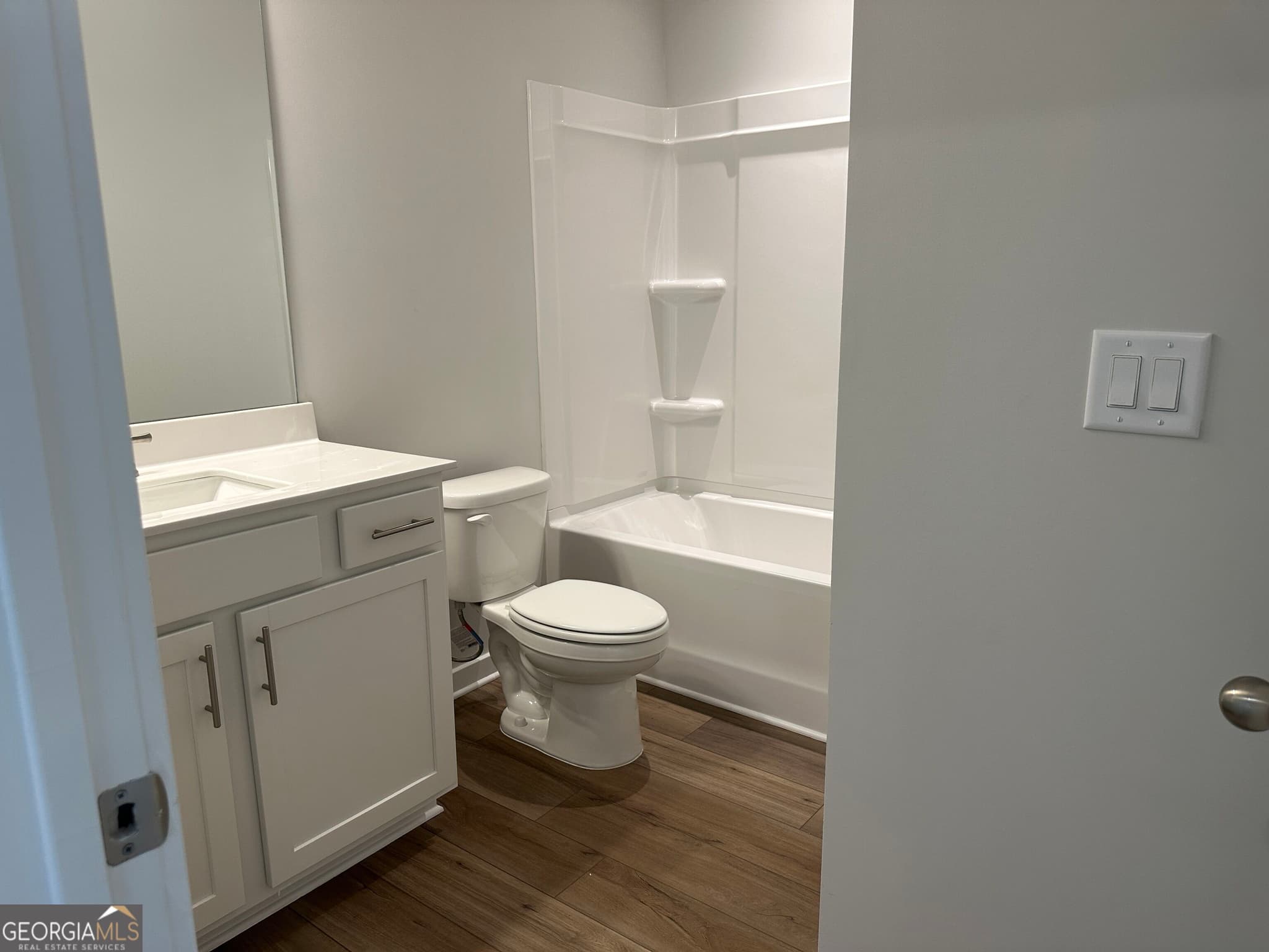 5 bedroom, 4 bathroom, 6,286 sq ft single family residence for sale at 606 Winding Rose Drive, Hoschton, GA 30548 — photo 6