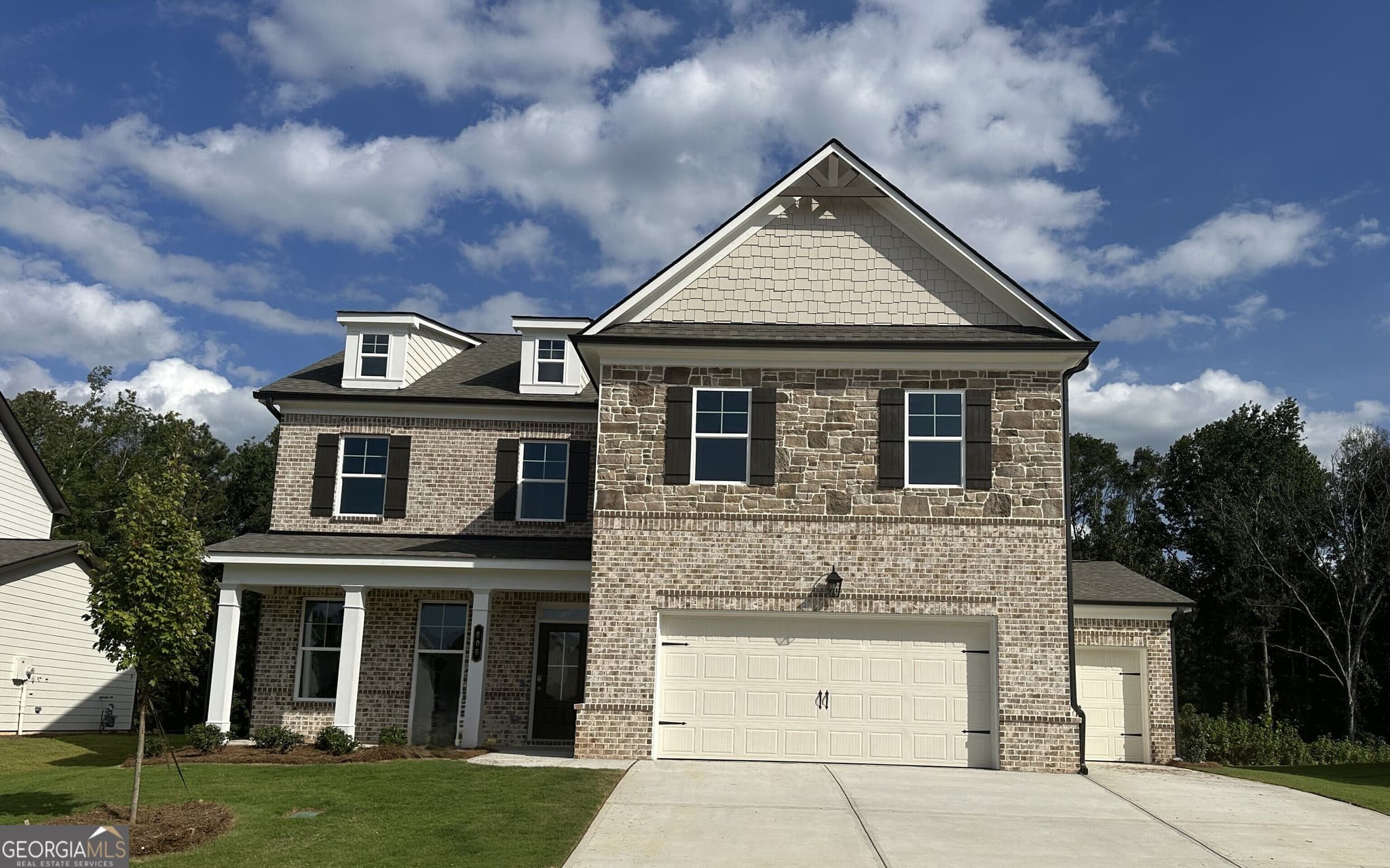 5 bedroom, 4 bathroom, 6,286 sq ft single family residence for sale at 606 Winding Rose Drive, Hoschton, GA 30548 — photo 1 of 42