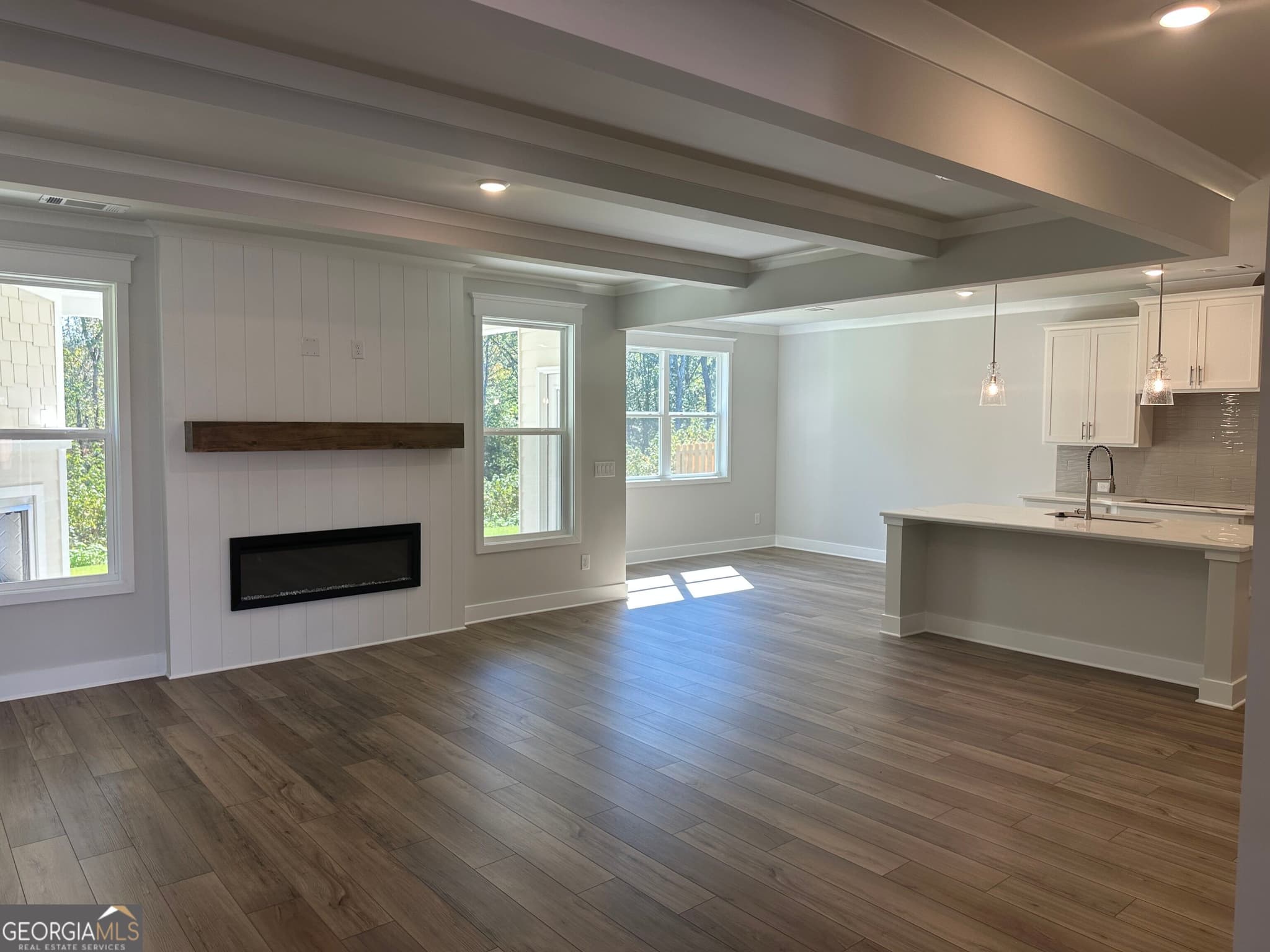 5 bedroom, 4 bathroom, 6,286 sq ft single family residence for sale at 606 Winding Rose Drive, Hoschton, GA 30548 — photo 5