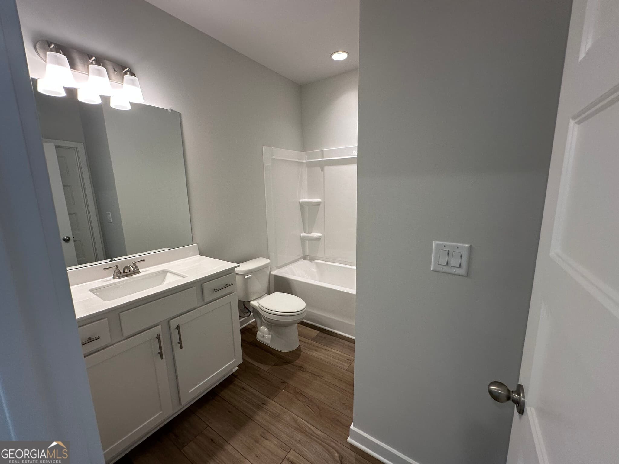 5 bedroom, 4 bathroom, 6,286 sq ft single family residence for sale at 606 Winding Rose Drive, Hoschton, GA 30548 — photo 8