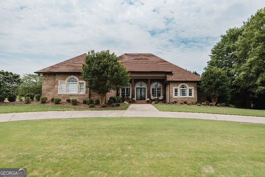 4 bedroom, 3.5 bathroom, 4,727 sq ft single family residence for sale at 605 Birkdale Boulevard, Carrollton, GA 30116 — photo 1 of 76