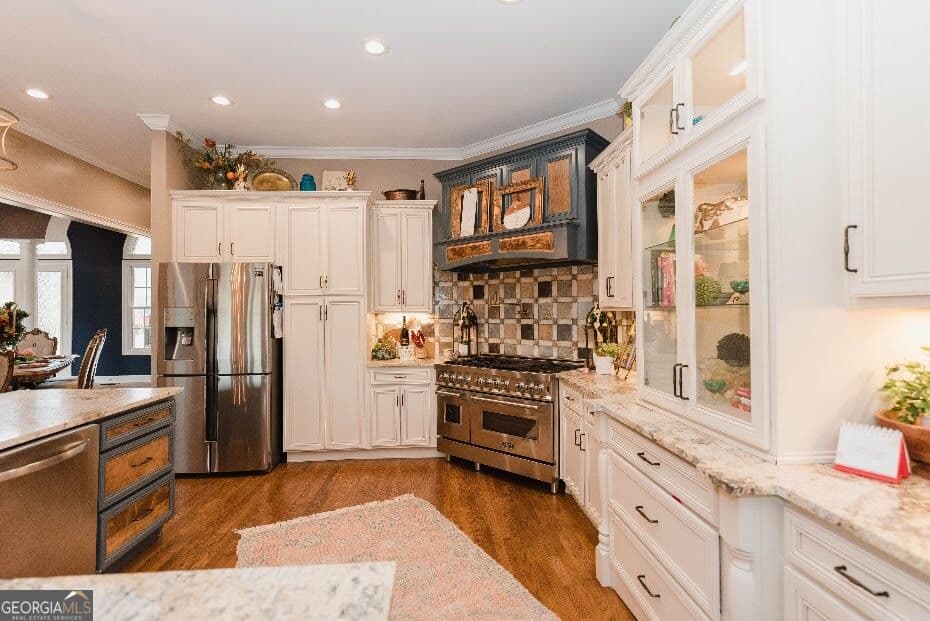4 bedroom, 3.5 bathroom, 4,727 sq ft single family residence for sale at 605 Birkdale Boulevard, Carrollton, GA 30116 — photo 8
