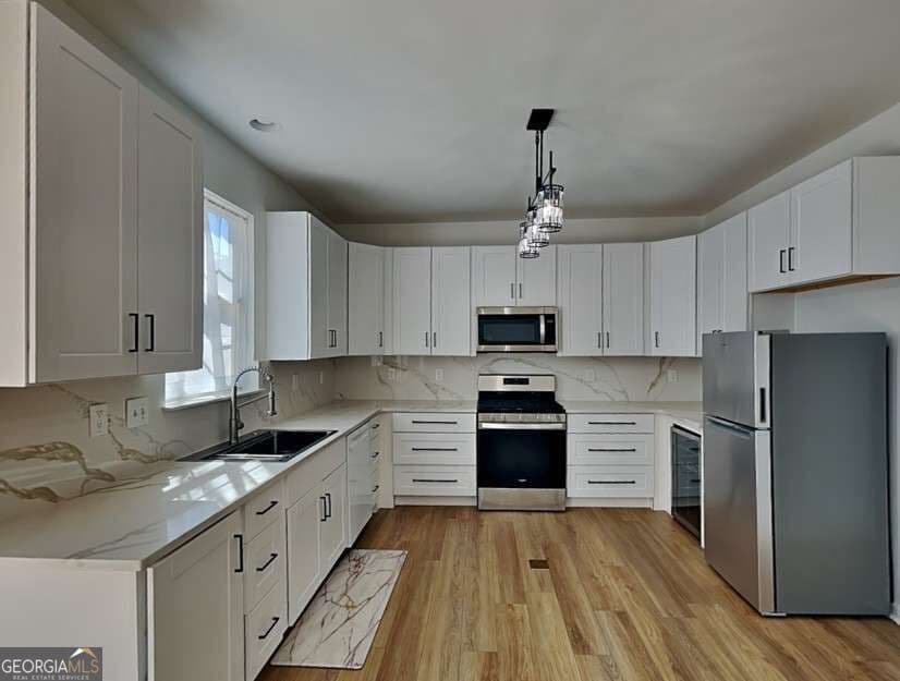 5 bedroom, 3.5 bathroom, 1,038 sq ft single family residence for sale at 515 Bigelow, College Park, GA 30349 — photo 6